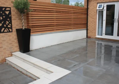Porcelain terrace with cedar screen.