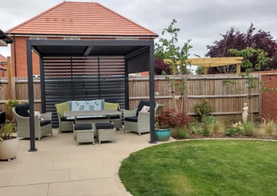 Steel pergola on porcelain terrace.