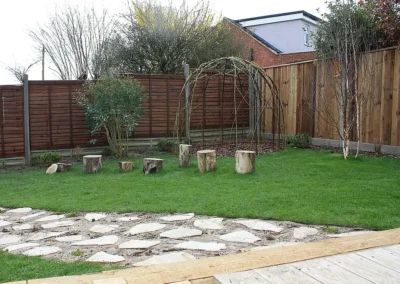 Sycamore logs on lawn.